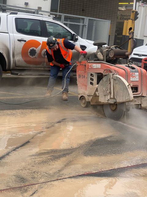 CA Driller operator using a floor saw to cut concrete